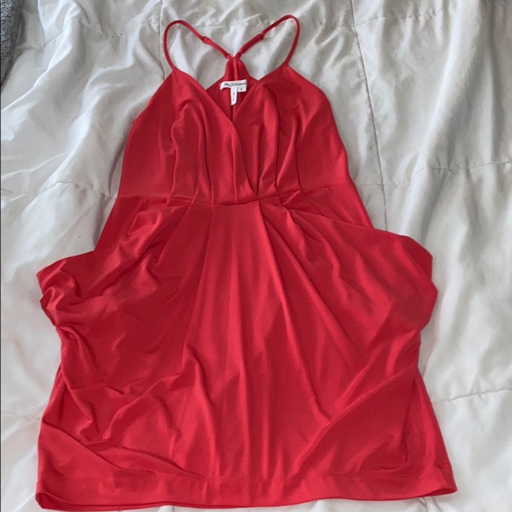 Bright coral dress.